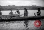 Image of natives in canoes Devil's Island French Guiana, 1939, second 26 stock footage video 65675030237