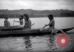 Image of natives in canoes Devil's Island French Guiana, 1939, second 29 stock footage video 65675030237