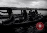 Image of natives in canoes Devil's Island French Guiana, 1939, second 34 stock footage video 65675030237