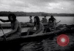 Image of natives in canoes Devil's Island French Guiana, 1939, second 36 stock footage video 65675030237