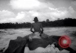 Image of natives in canoes Devil's Island French Guiana, 1939, second 40 stock footage video 65675030237