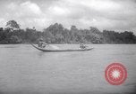 Image of natives in canoes Devil's Island French Guiana, 1939, second 45 stock footage video 65675030237