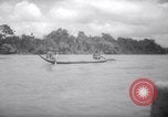 Image of natives in canoes Devil's Island French Guiana, 1939, second 46 stock footage video 65675030237
