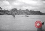 Image of natives in canoes Devil's Island French Guiana, 1939, second 47 stock footage video 65675030237