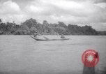 Image of natives in canoes Devil's Island French Guiana, 1939, second 48 stock footage video 65675030237