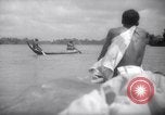 Image of natives in canoes Devil's Island French Guiana, 1939, second 51 stock footage video 65675030237