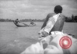 Image of natives in canoes Devil's Island French Guiana, 1939, second 53 stock footage video 65675030237