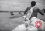 Image of natives in canoes Devil's Island French Guiana, 1939, second 54 stock footage video 65675030237