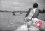 Image of natives in canoes Devil's Island French Guiana, 1939, second 55 stock footage video 65675030237