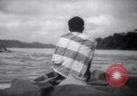 Image of natives in canoes Devil's Island French Guiana, 1939, second 56 stock footage video 65675030237