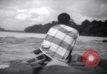 Image of natives in canoes Devil's Island French Guiana, 1939, second 60 stock footage video 65675030237