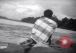 Image of natives in canoes Devil's Island French Guiana, 1939, second 61 stock footage video 65675030237