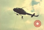 Image of helicopter rappel Ankhe South Vietnam, 1966, second 6 stock footage video 65675030382