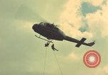 Image of helicopter rappel Ankhe South Vietnam, 1966, second 7 stock footage video 65675030382