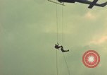 Image of helicopter rappel Ankhe South Vietnam, 1966, second 9 stock footage video 65675030382