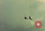 Image of helicopter rappel Ankhe South Vietnam, 1966, second 10 stock footage video 65675030382