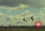 Image of helicopter rappel Ankhe South Vietnam, 1966, second 12 stock footage video 65675030382