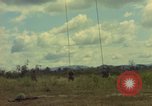 Image of helicopter rappel Ankhe South Vietnam, 1966, second 14 stock footage video 65675030382