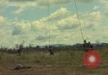 Image of helicopter rappel Ankhe South Vietnam, 1966, second 18 stock footage video 65675030382
