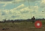 Image of helicopter rappel Ankhe South Vietnam, 1966, second 20 stock footage video 65675030382