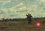 Image of helicopter rappel Ankhe South Vietnam, 1966, second 24 stock footage video 65675030382