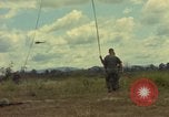 Image of helicopter rappel Ankhe South Vietnam, 1966, second 25 stock footage video 65675030382