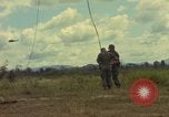 Image of helicopter rappel Ankhe South Vietnam, 1966, second 26 stock footage video 65675030382