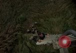 Image of helicopter rappel Ankhe South Vietnam, 1966, second 27 stock footage video 65675030382