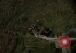 Image of helicopter rappel Ankhe South Vietnam, 1966, second 31 stock footage video 65675030382