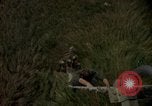 Image of helicopter rappel Ankhe South Vietnam, 1966, second 33 stock footage video 65675030382