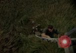 Image of helicopter rappel Ankhe South Vietnam, 1966, second 34 stock footage video 65675030382