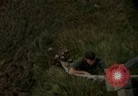 Image of helicopter rappel Ankhe South Vietnam, 1966, second 36 stock footage video 65675030382
