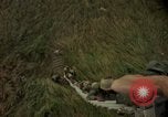 Image of helicopter rappel Ankhe South Vietnam, 1966, second 41 stock footage video 65675030382