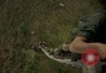Image of helicopter rappel Ankhe South Vietnam, 1966, second 42 stock footage video 65675030382
