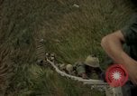 Image of helicopter rappel Ankhe South Vietnam, 1966, second 43 stock footage video 65675030382