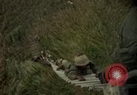 Image of helicopter rappel Ankhe South Vietnam, 1966, second 44 stock footage video 65675030382