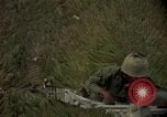 Image of helicopter rappel Ankhe South Vietnam, 1966, second 48 stock footage video 65675030382