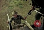 Image of helicopter rappel Ankhe South Vietnam, 1966, second 50 stock footage video 65675030382