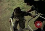 Image of helicopter rappel Ankhe South Vietnam, 1966, second 52 stock footage video 65675030382