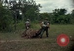 Standbild clearing Brush Ankhe Süd Vietnam, 1965, aus Sekunde 60 historischem Filmmaterial Videoclip 65675030389