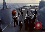 Image of HUS1 UH-34D Seahorse lands on USS North Hampton Atlantic Ocean, 1962, second 8 stock footage video 65675030397