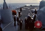 Image of HUS1 UH-34D Seahorse lands on USS North Hampton Atlantic Ocean, 1962, second 11 stock footage video 65675030397
