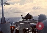 Image of HUS1 UH-34D Seahorse lands on USS North Hampton Atlantic Ocean, 1962, second 29 stock footage video 65675030397