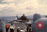 Image of HUS1 UH-34D Seahorse lands on USS North Hampton Atlantic Ocean, 1962, second 41 stock footage video 65675030397