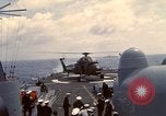 Image of HUS1 UH-34D Seahorse lands on USS North Hampton Atlantic Ocean, 1962, second 44 stock footage video 65675030397