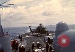Image of HUS1 UH-34D Seahorse lands on USS North Hampton Atlantic Ocean, 1962, second 45 stock footage video 65675030397