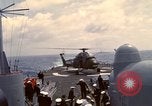 Image of HUS1 UH-34D Seahorse lands on USS North Hampton Atlantic Ocean, 1962, second 47 stock footage video 65675030397