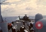 Image of HUS1 UH-34D Seahorse lands on USS North Hampton Atlantic Ocean, 1962, second 51 stock footage video 65675030397