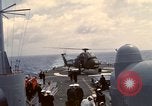 Image of HUS1 UH-34D Seahorse lands on USS North Hampton Atlantic Ocean, 1962, second 60 stock footage video 65675030397