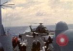 Image of HUS1 UH-34D Seahorse lands on USS North Hampton Atlantic Ocean, 1962, second 62 stock footage video 65675030397